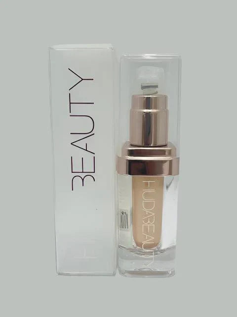 Huda Beauty Nymph All Over Highlighter 15ML – Radiant Body & Face Glow
